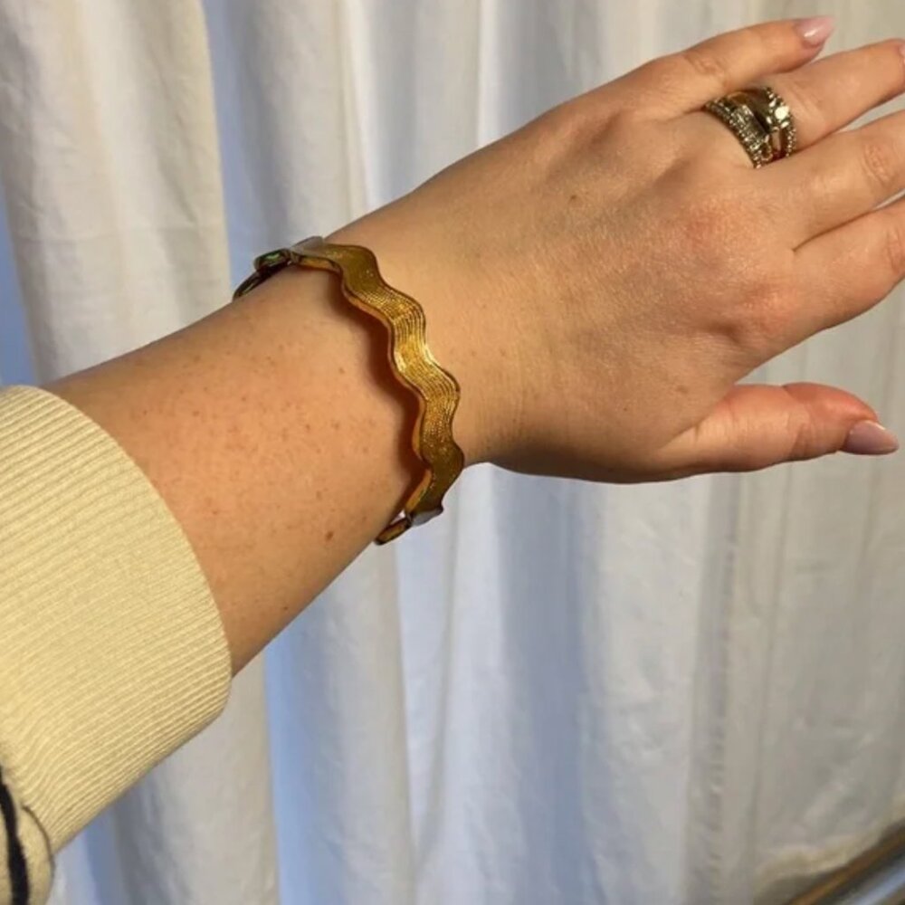 Kate Spade “Ric Rac” Gold Enamel Gold Bangle